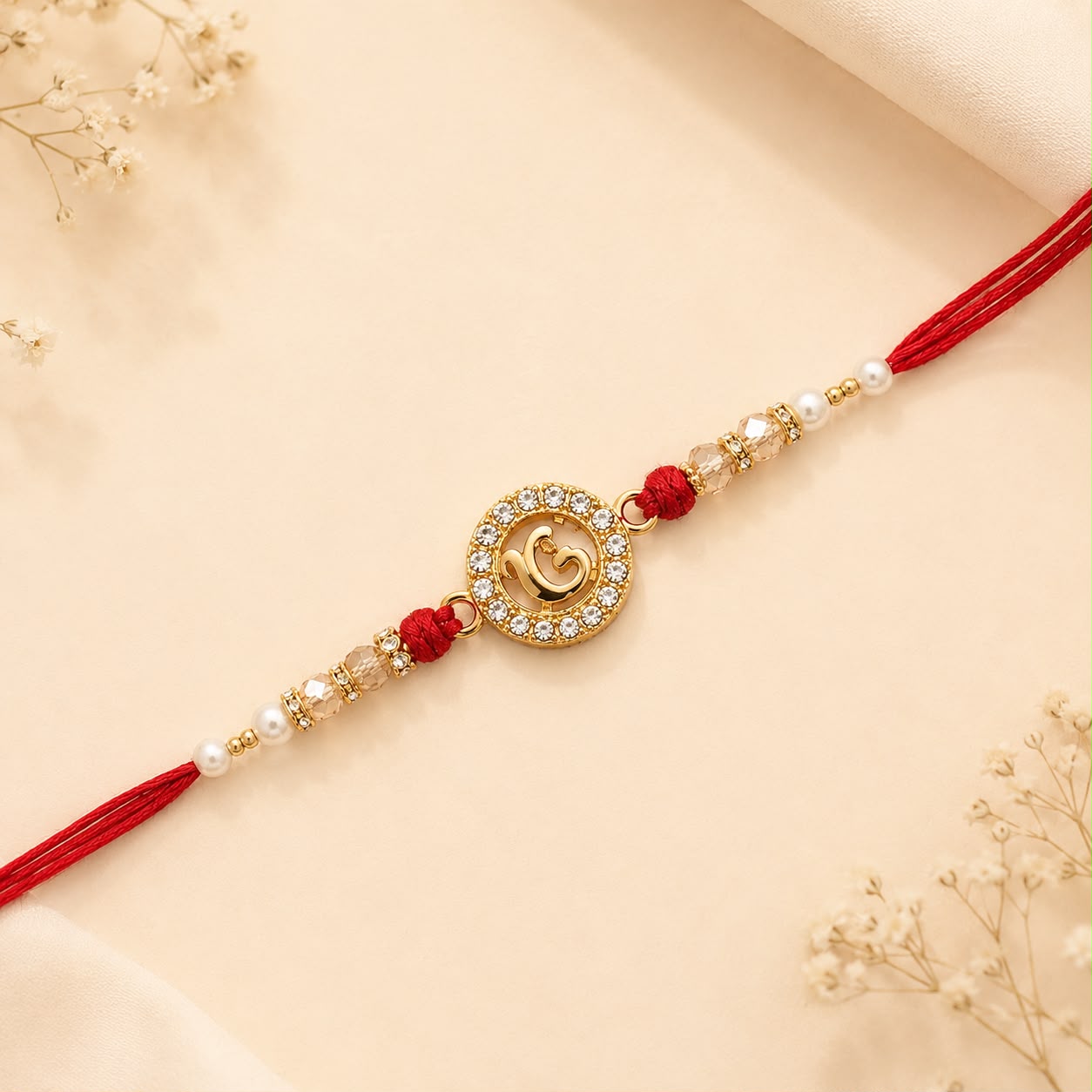 Ekomkar Symbol Designer Rakhi with Crystal & Pearl Beads