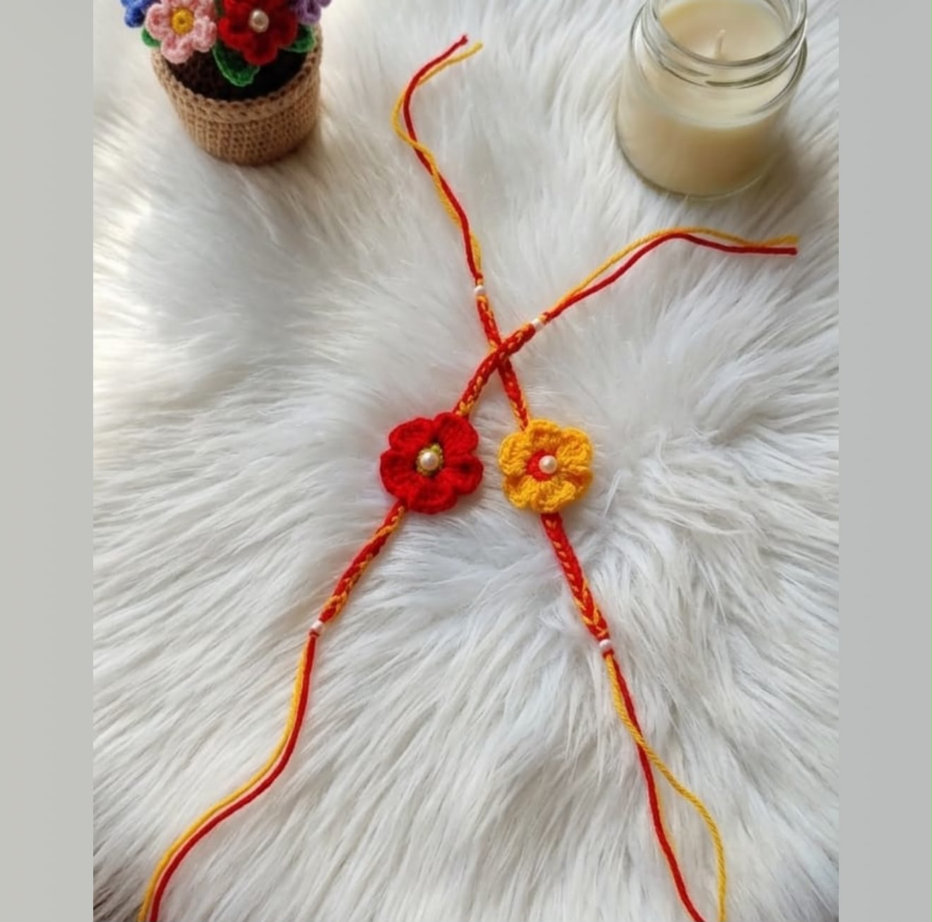Product Name: Handmade Crochet Flower Rakhi – Red & Yellowv